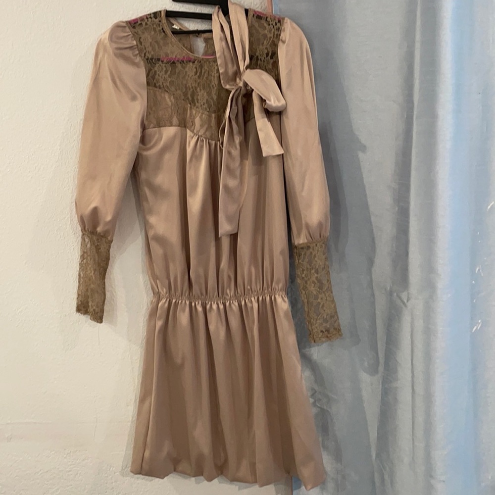 Made in Korea. Beige long sleeve dress with belt.